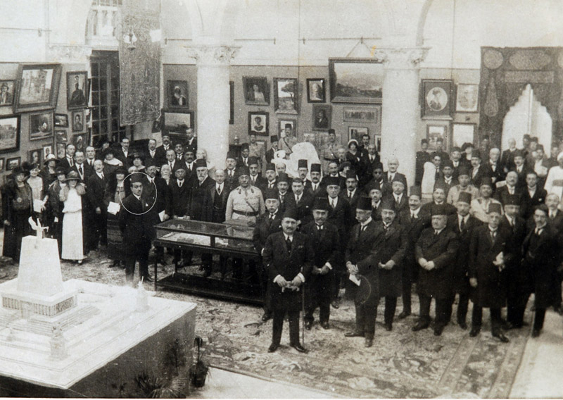 In 1923, the Friends of the Arts collective organized their first exhibition, showing the works of a number of Egyptian painters and sculptors.  It was inaugurated by King Fouad I, who bought one of Charobim's paintings entitled The Dog. The sculpture in the forefront is Mahmoud Mokhtar's Al-Nahda Al-Masriya (Renaissance).